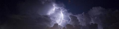 Blue-white lightning strikes